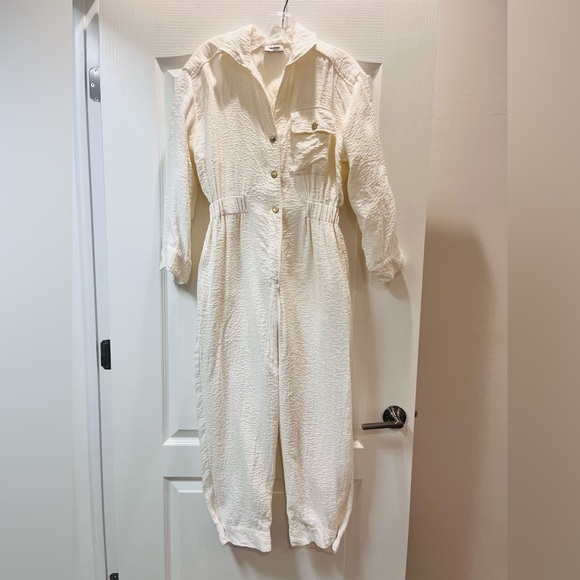 Sandro long-sleeved ivory pant Jumpsuit with gold snap buttons.Women’s M - Picture 13 of 13